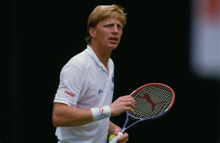 Boris Becker looks on