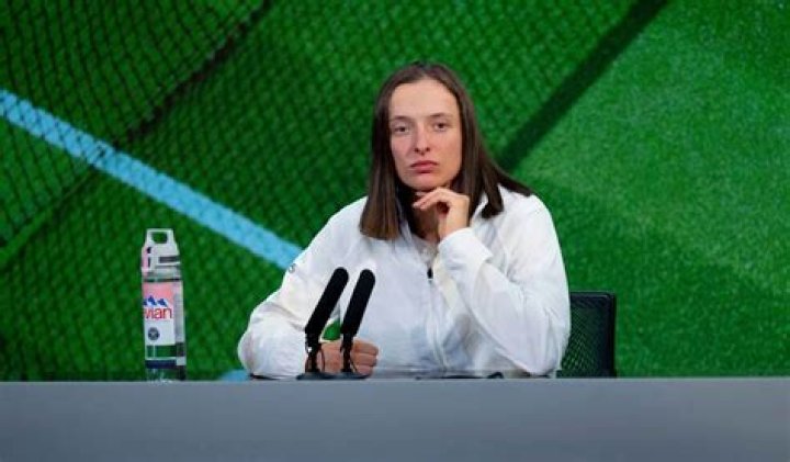 Iga Swiatek talks to the media