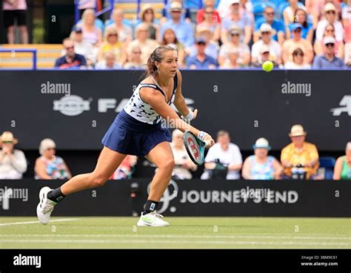 Jodie Burrage plays a shot