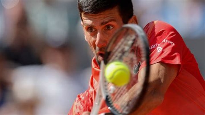 Novak Djokovic plays a shot